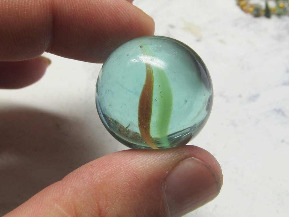 1'' glass marbles Antiques Board