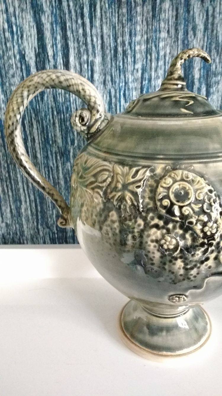 Strange weird tea pot Antiques Board