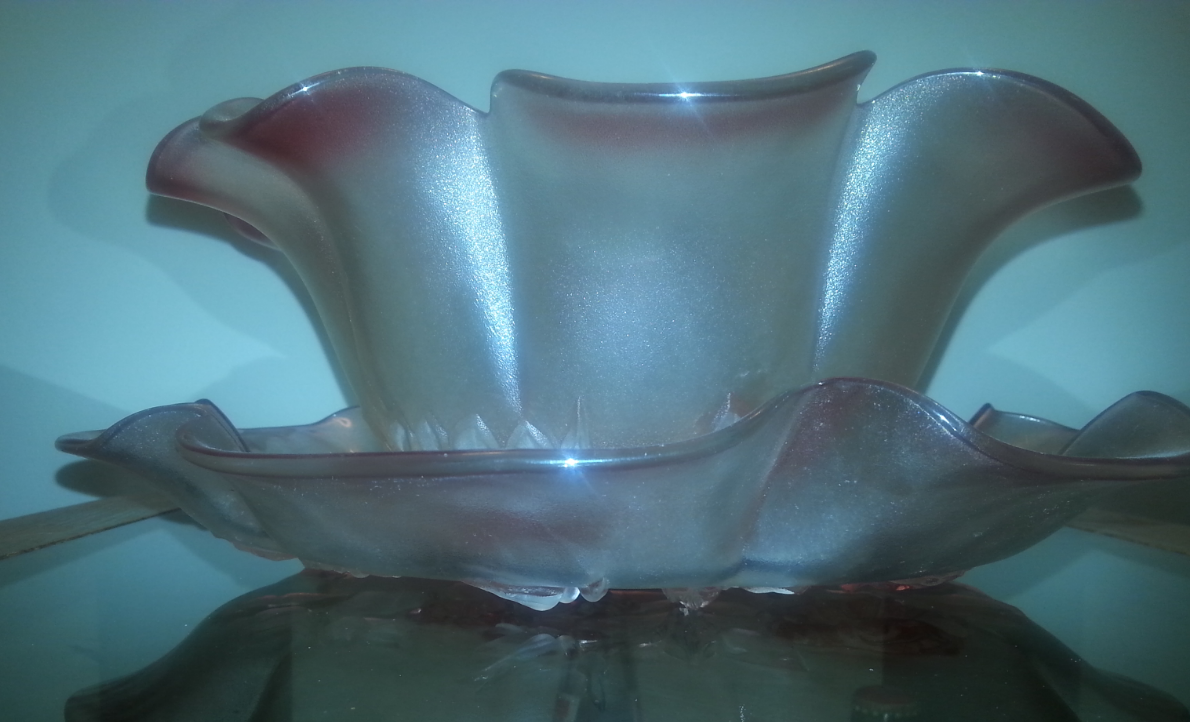 Can someone tell me if this is Fenton? Antiques Board