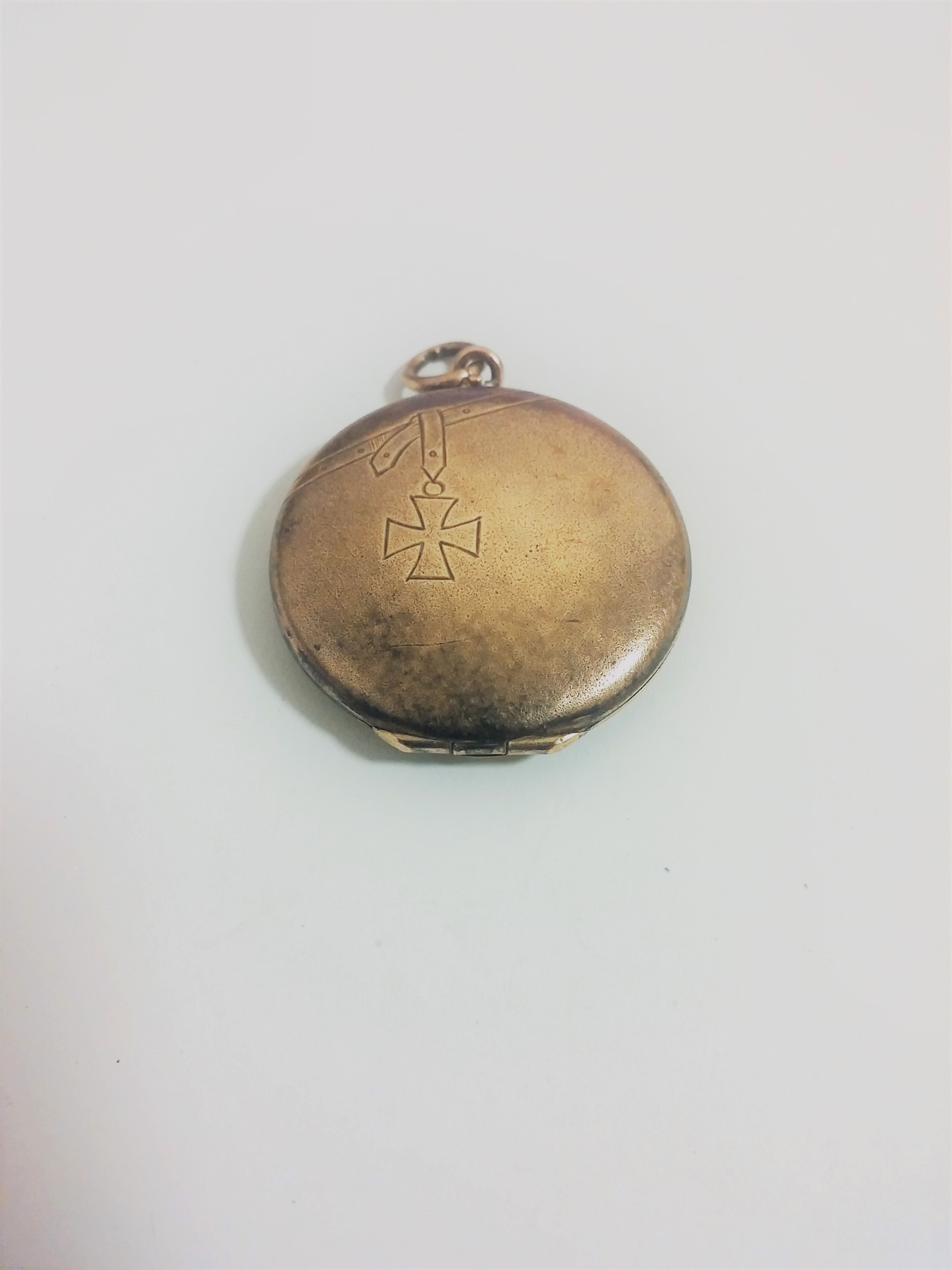 Symbolism of Locket with Iron Cross and Garter Antiques Board