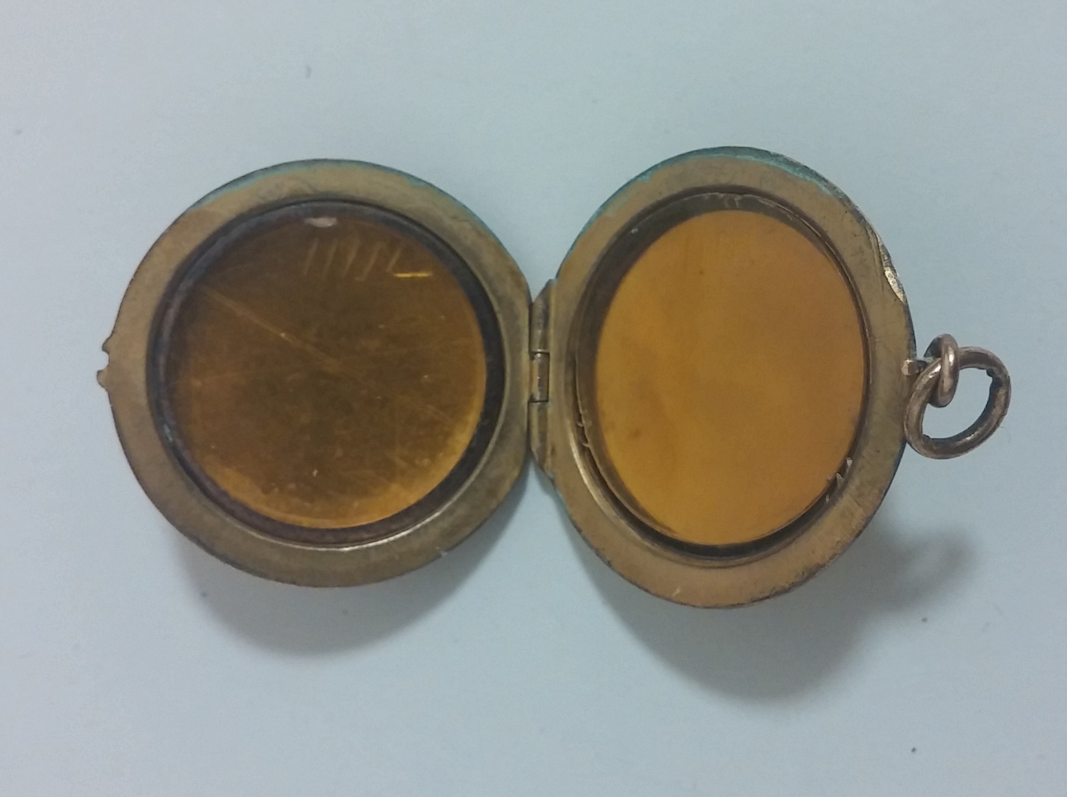 Symbolism of Locket with Iron Cross and Garter Antiques Board