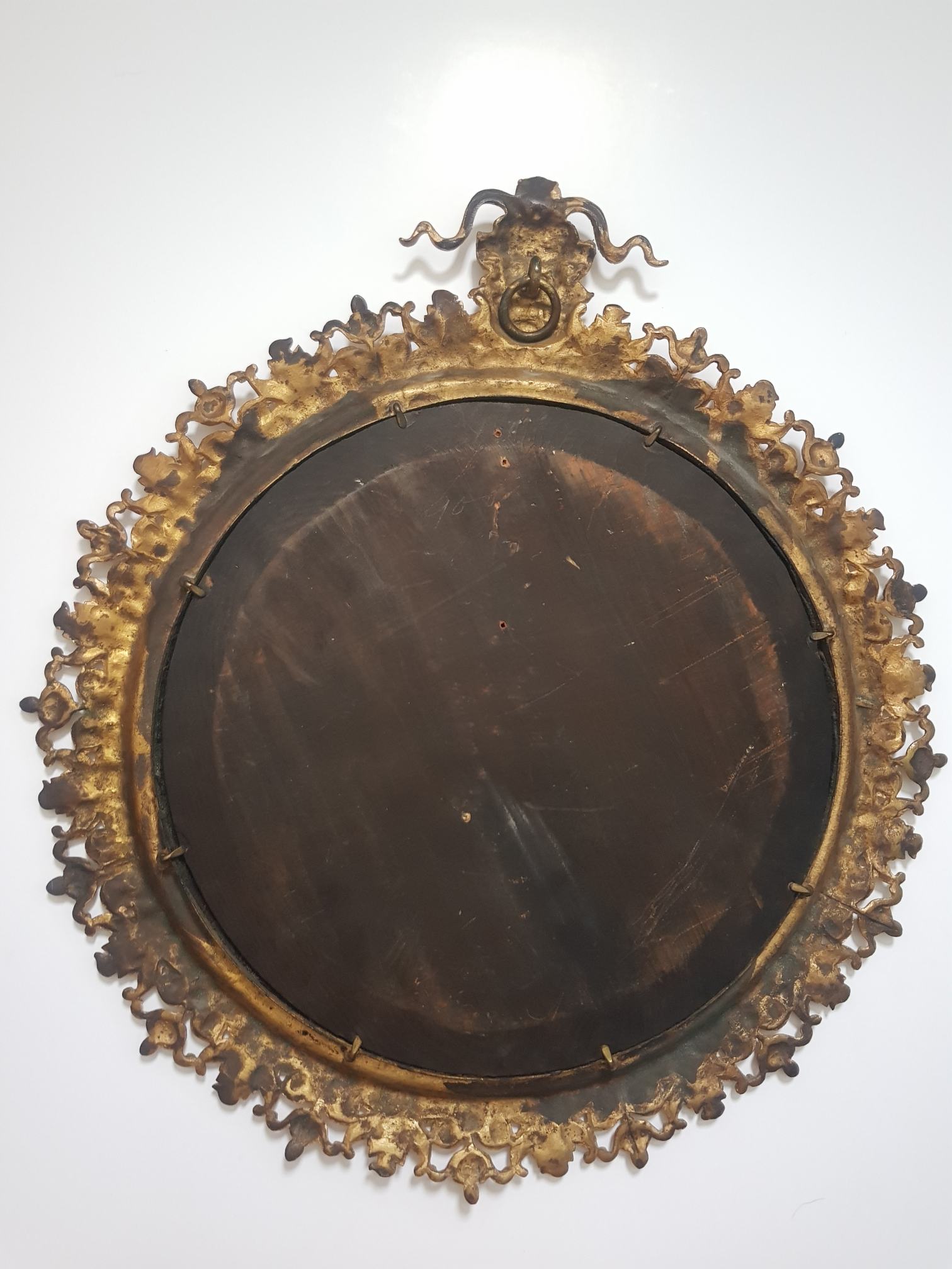 Brass (?) mirror Antiques Board