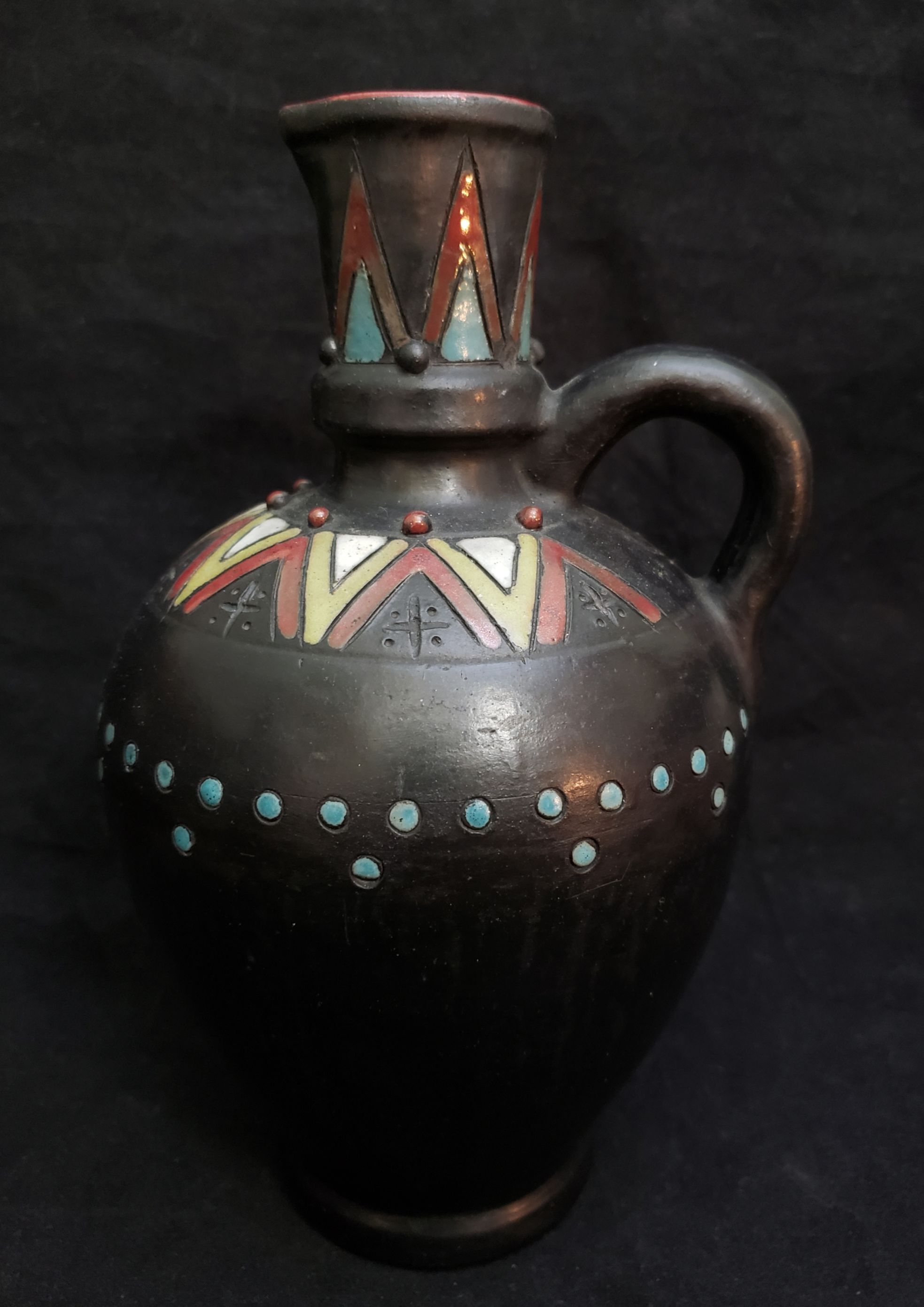 Black clay pottery pitcher Antiques Board