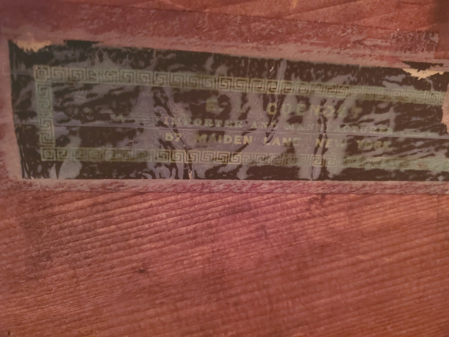 E.L. Cuendet music box Antiques Board