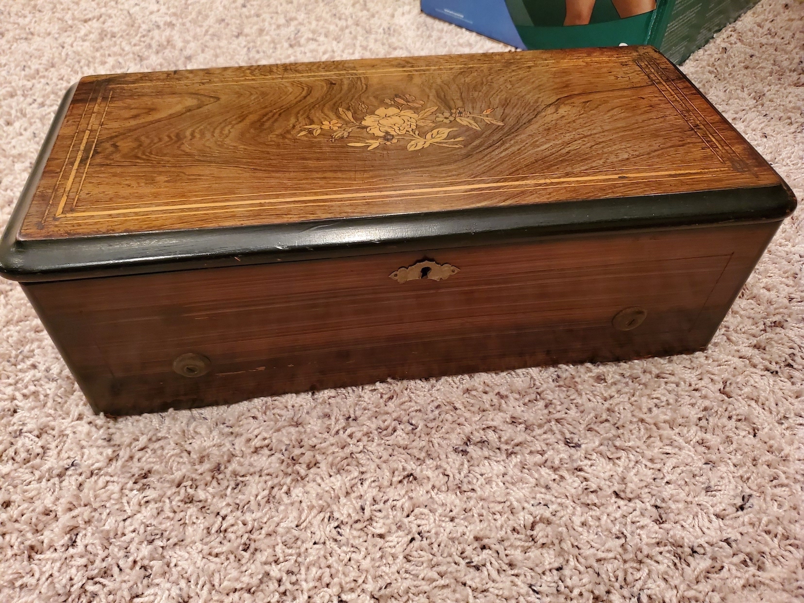 E.L. Cuendet music box Antiques Board