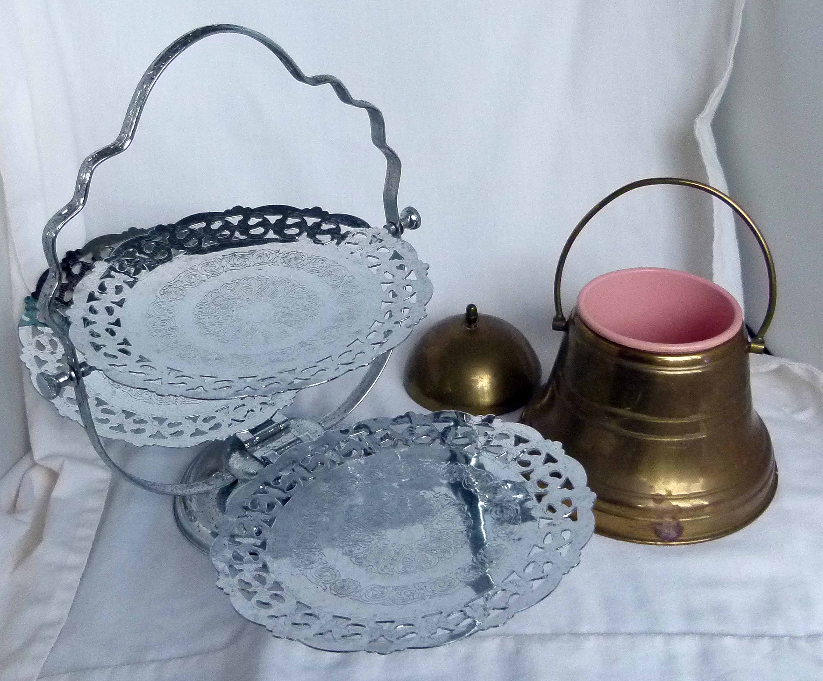 26. 1930s folding chrome cake stand and butter pot.jpg