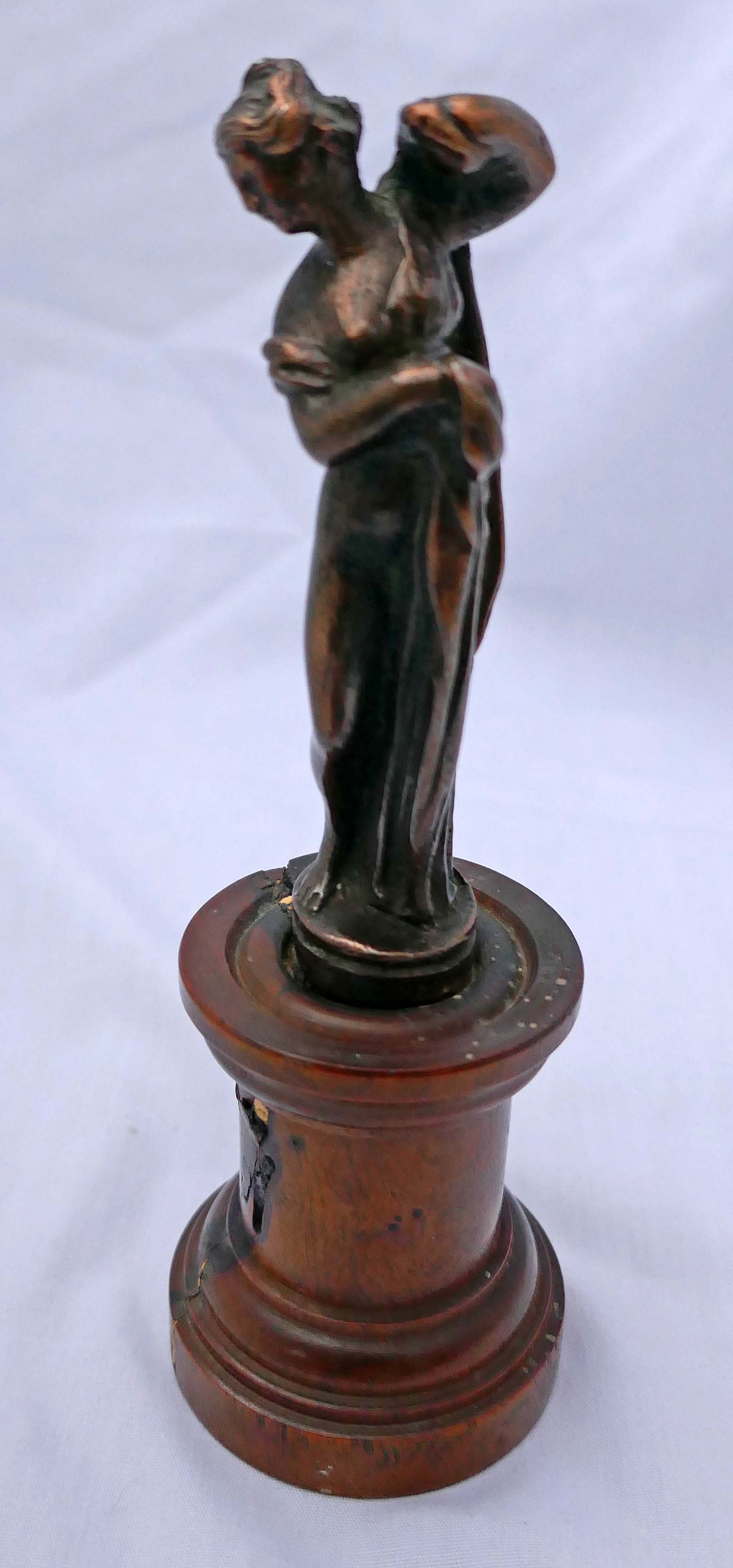 26. Vintage car mascot mounted on block.jpg