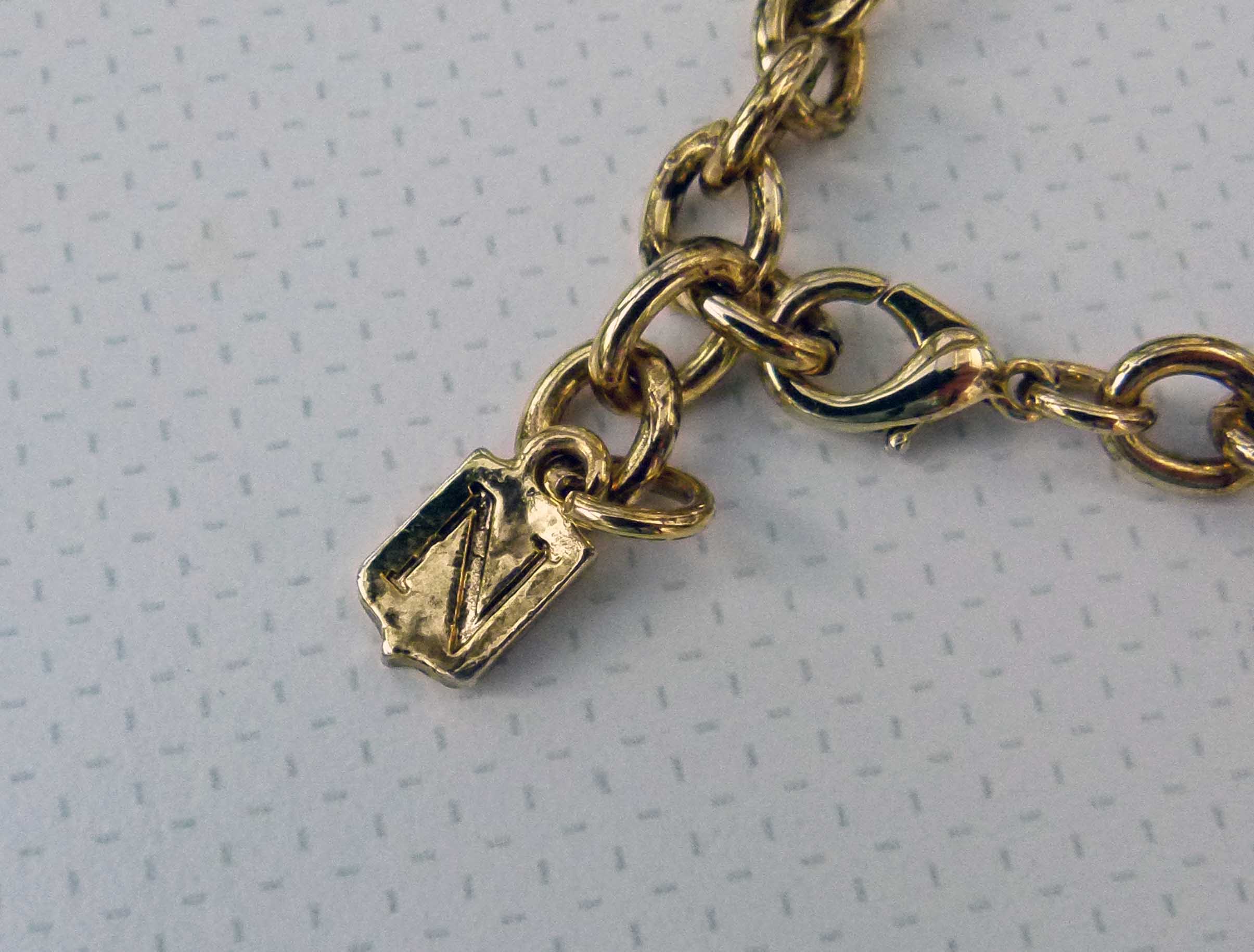 Anyone recognise this costume jewellery mark please? Antiques Board