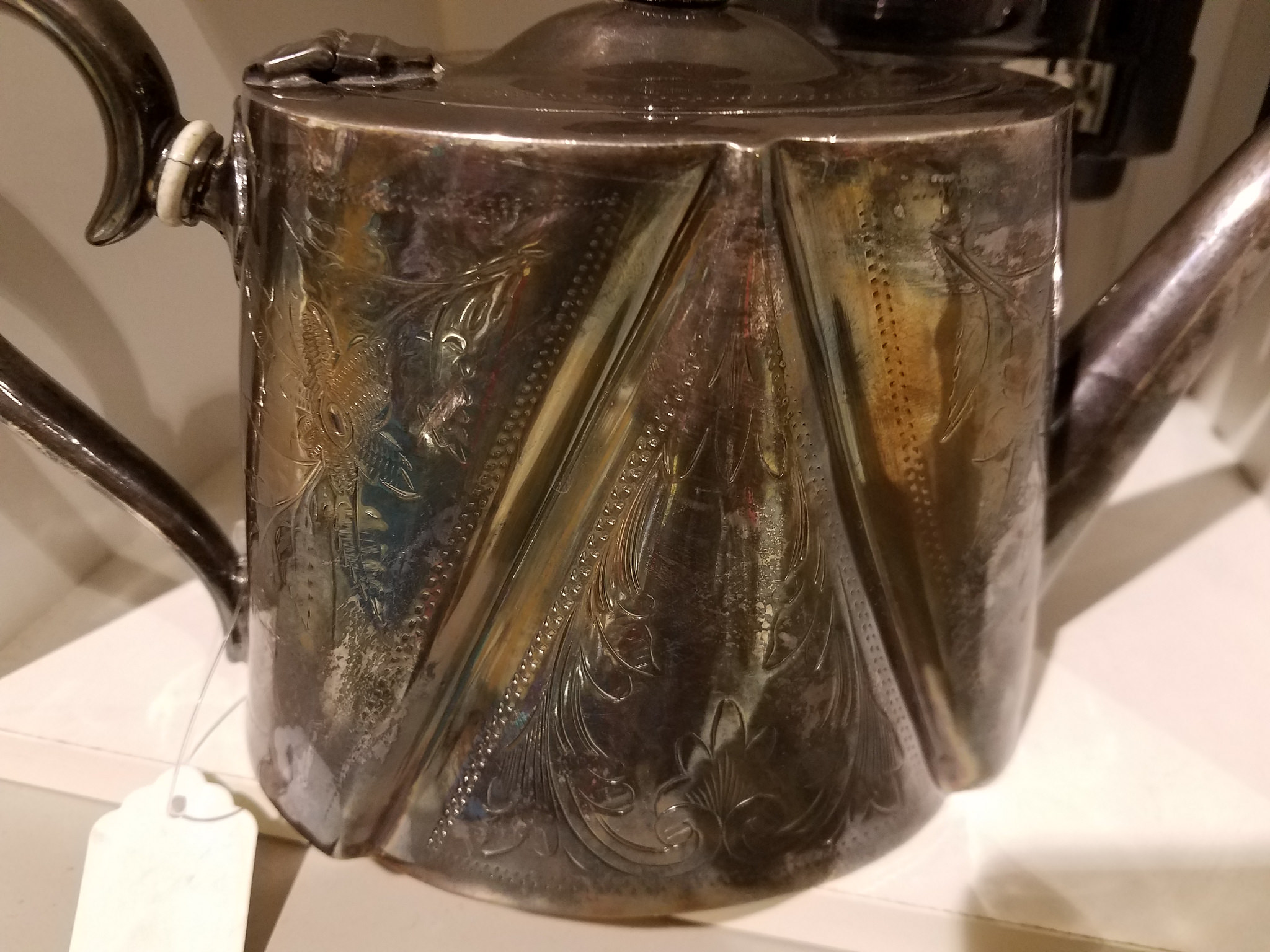 Silver Teapot Hallmark(s) ID help is it plated or the real dealio