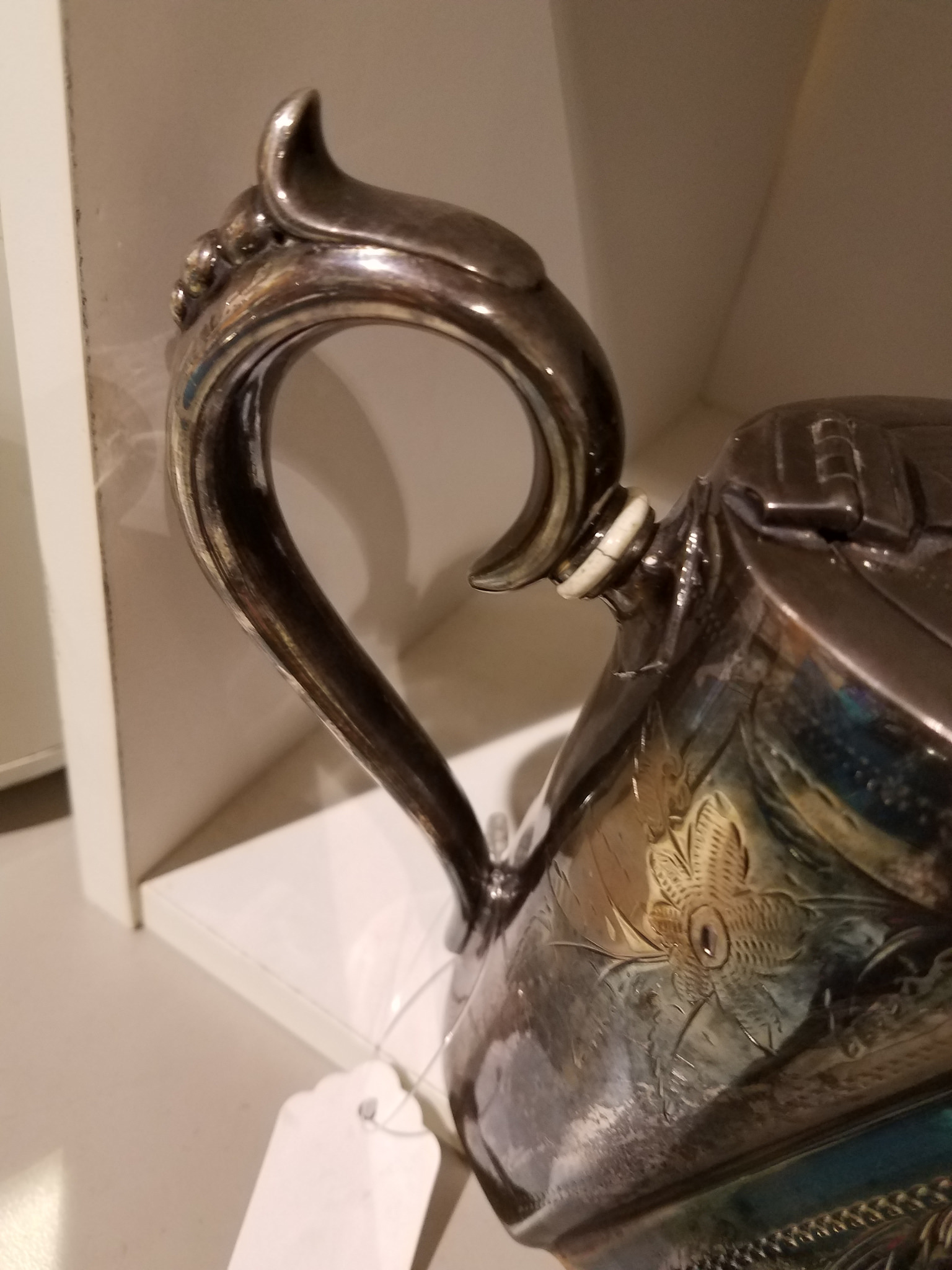 Silver Teapot Hallmark(s) ID help is it plated or the real dealio
