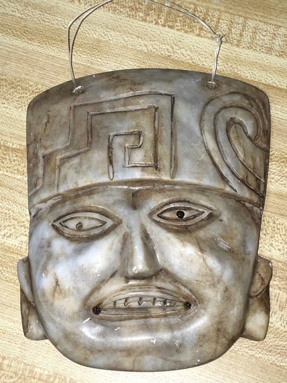 Carved Soapstone Mask Antiques Board
