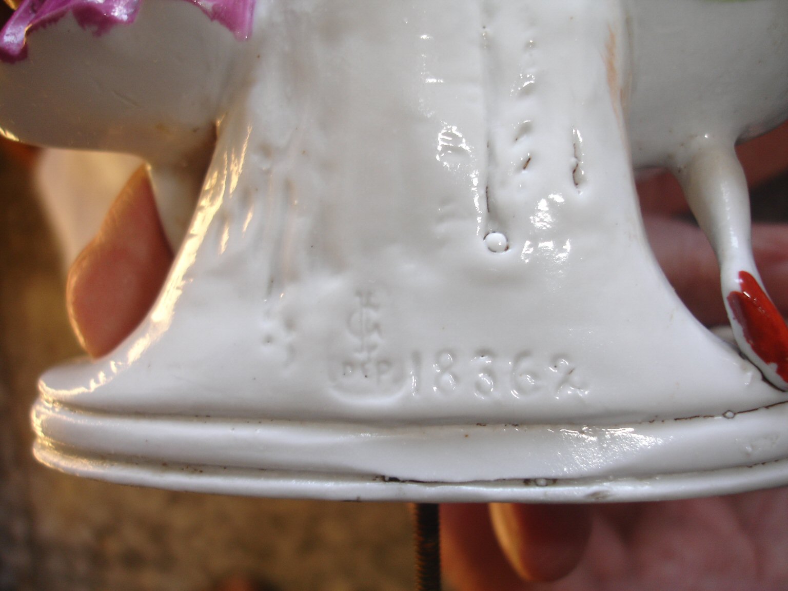 Identify porcelain figurine Antiques Board