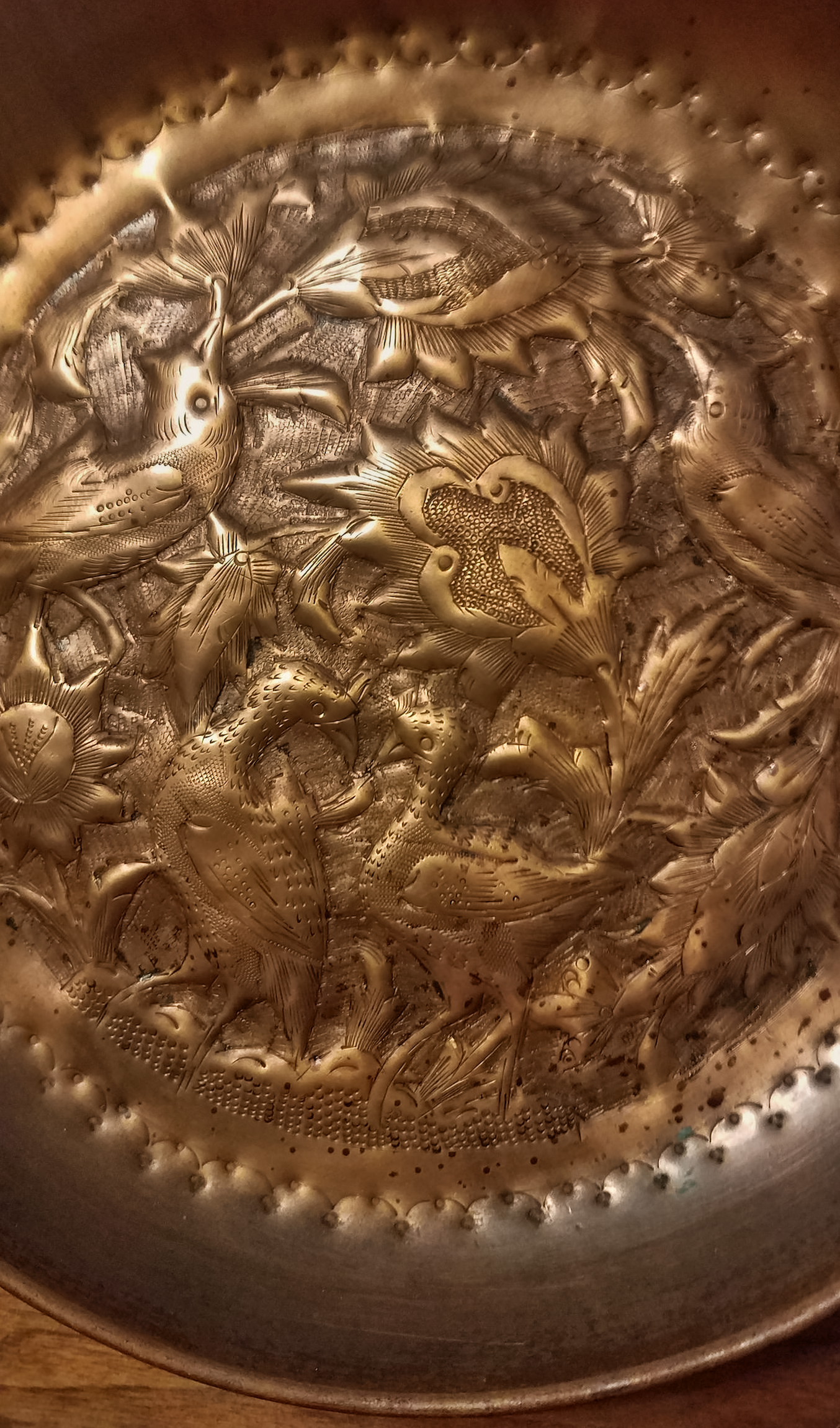 Copper repoussé and chased copper decorative plates where from