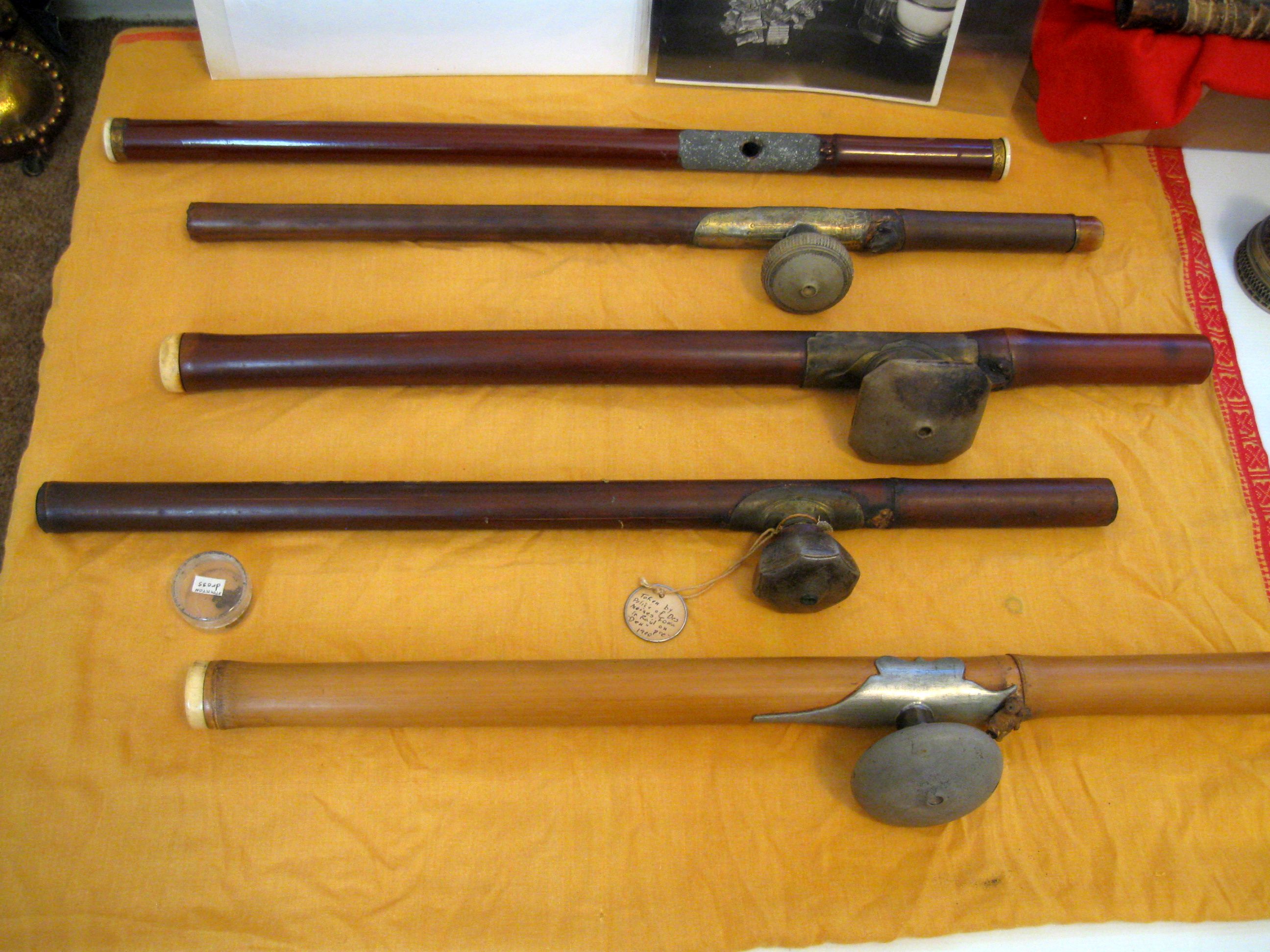 5 pipes - pre-1900 - Demoines Iowa police raid 01.jpg