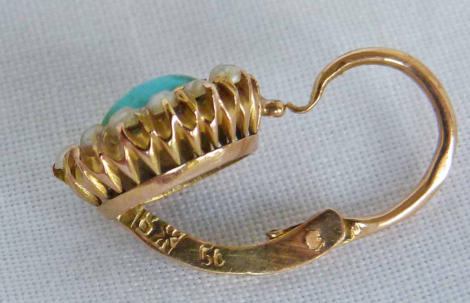 6a. mark on earrings.jpg