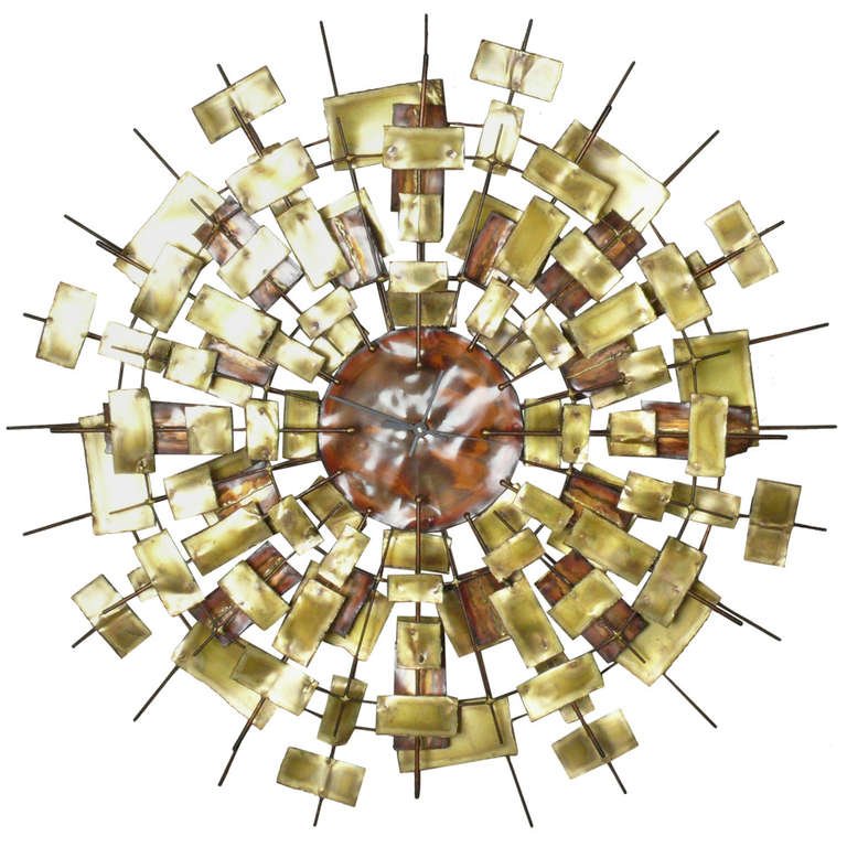 large round metal clock Antiques Board