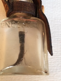 antique-glass-bottle-leather-strap-london-closeup.JPG