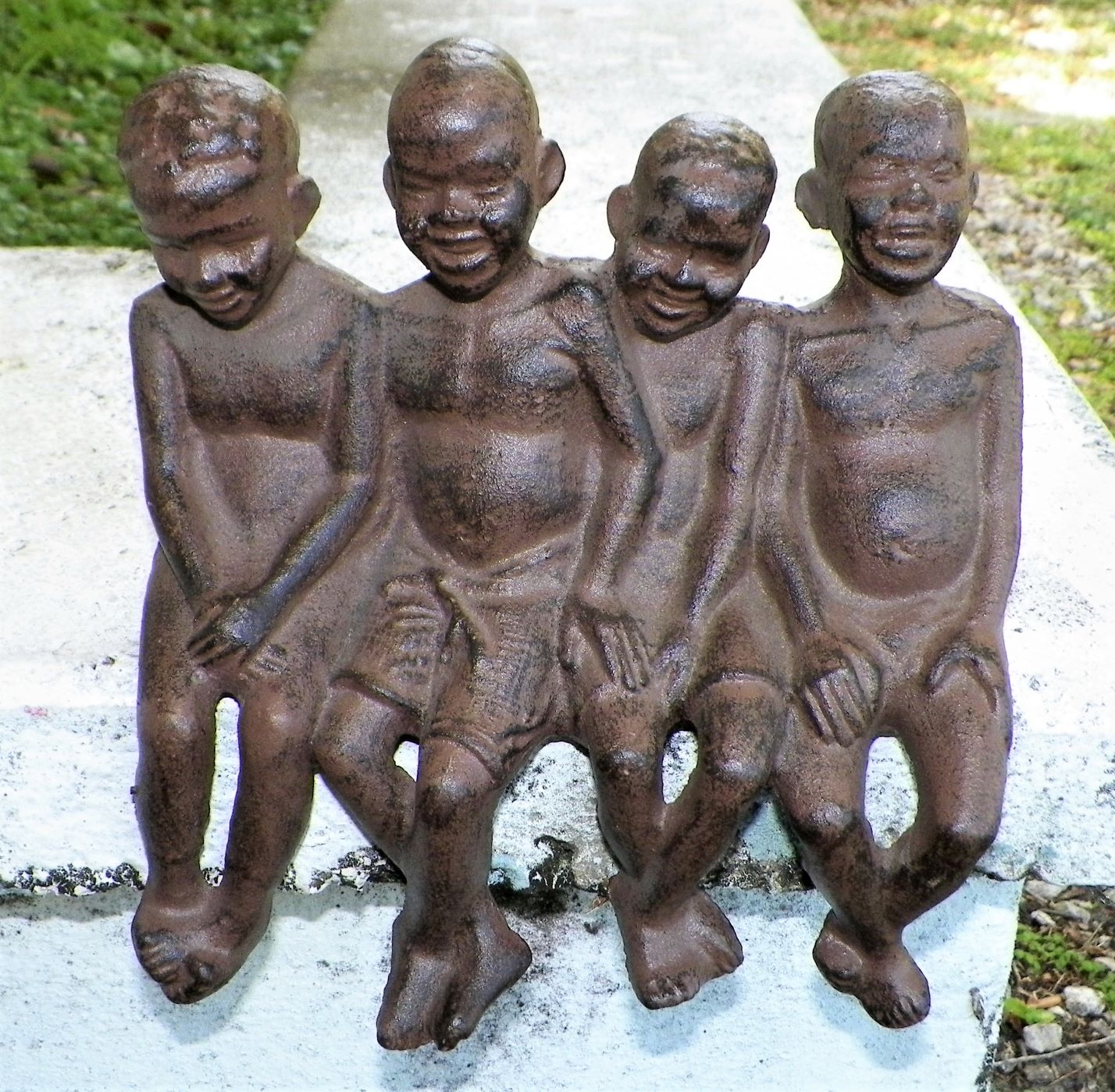 ART STATUE BOYS CAST IRON GROUP 1AA.JPG