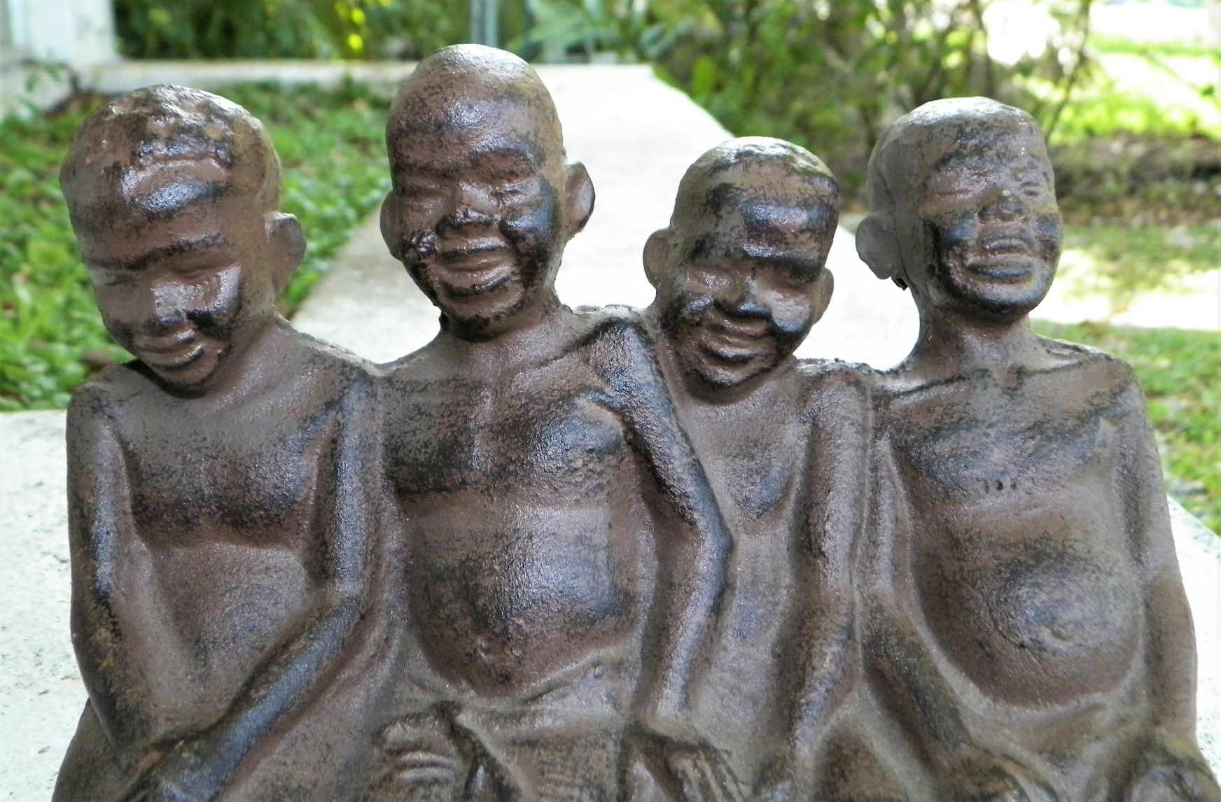 ART STATUE BOYS CAST IRON GROUP 1AAA.JPG