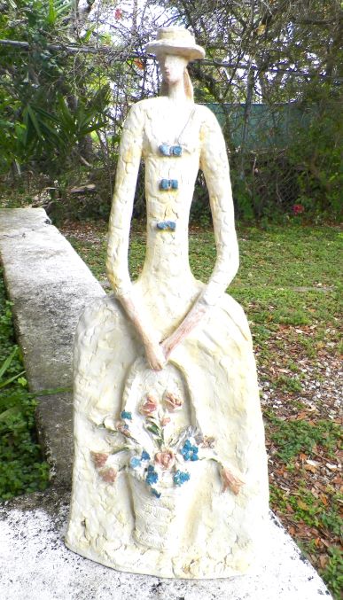 ART STATUE SEVER THIN WOMAN WITH FLOWERS 1AAA.JPG