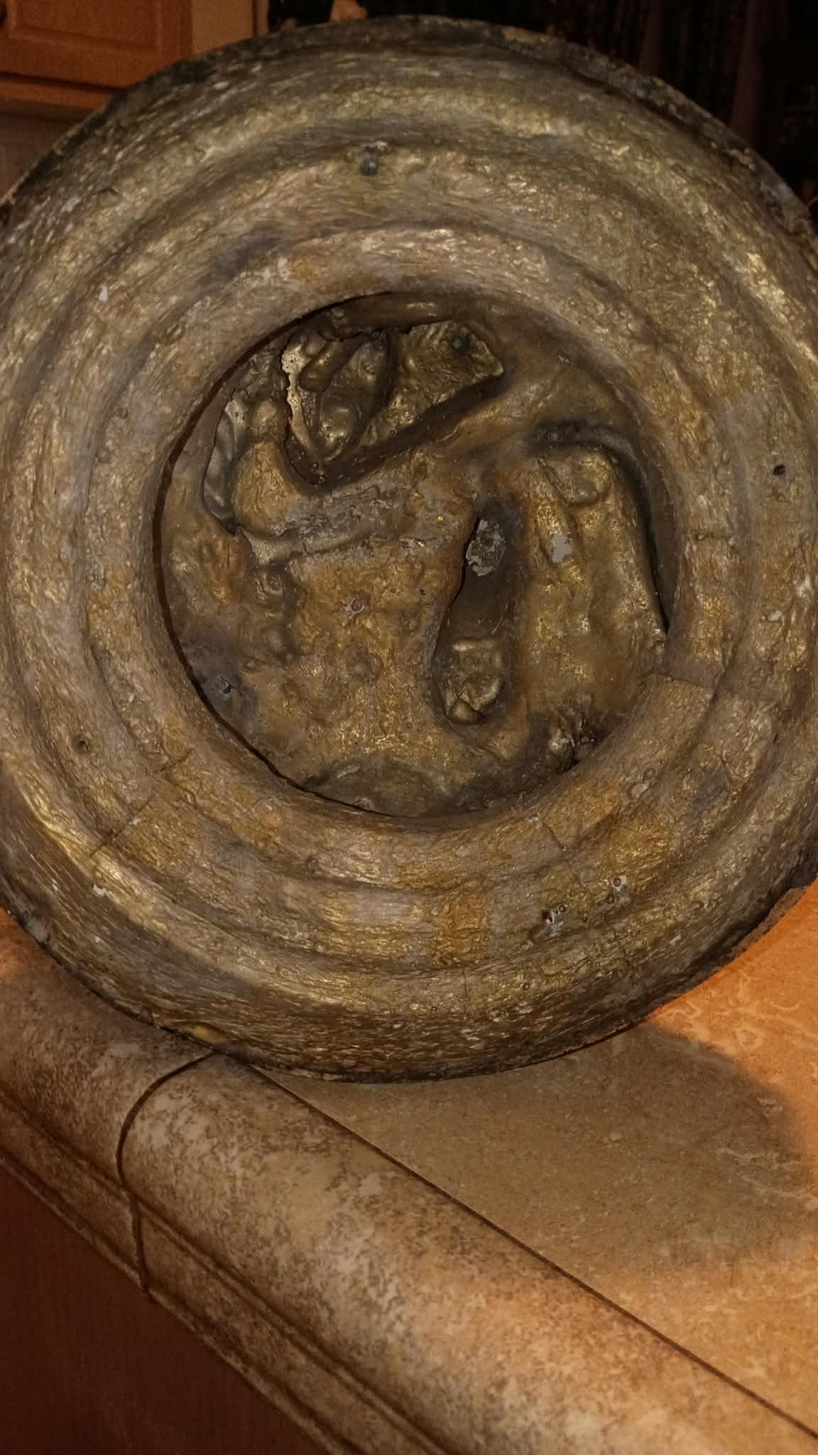 Bronze Statue inside base.jpeg