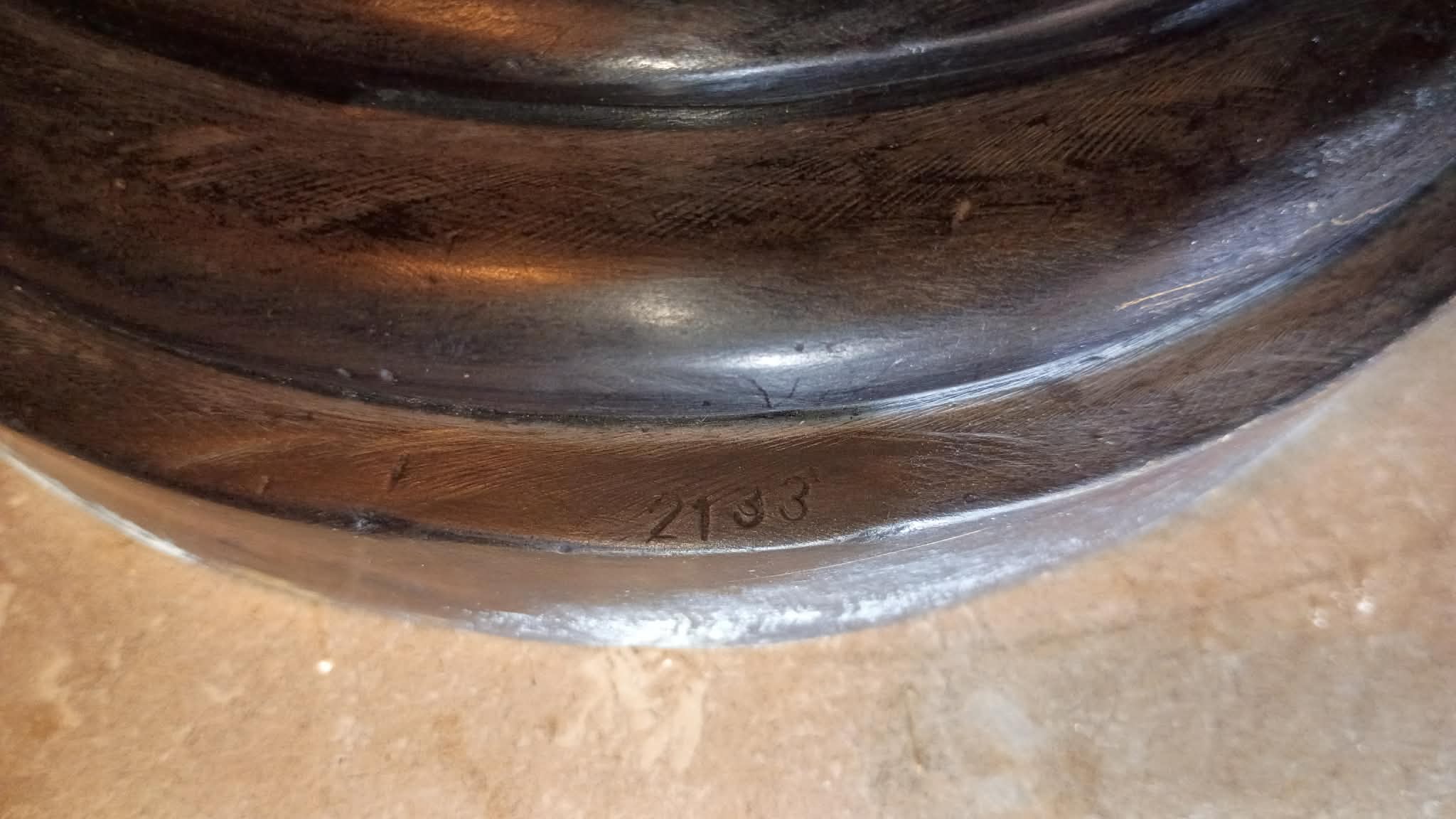 Bronze Statue Numbering on Base 2133.jpeg