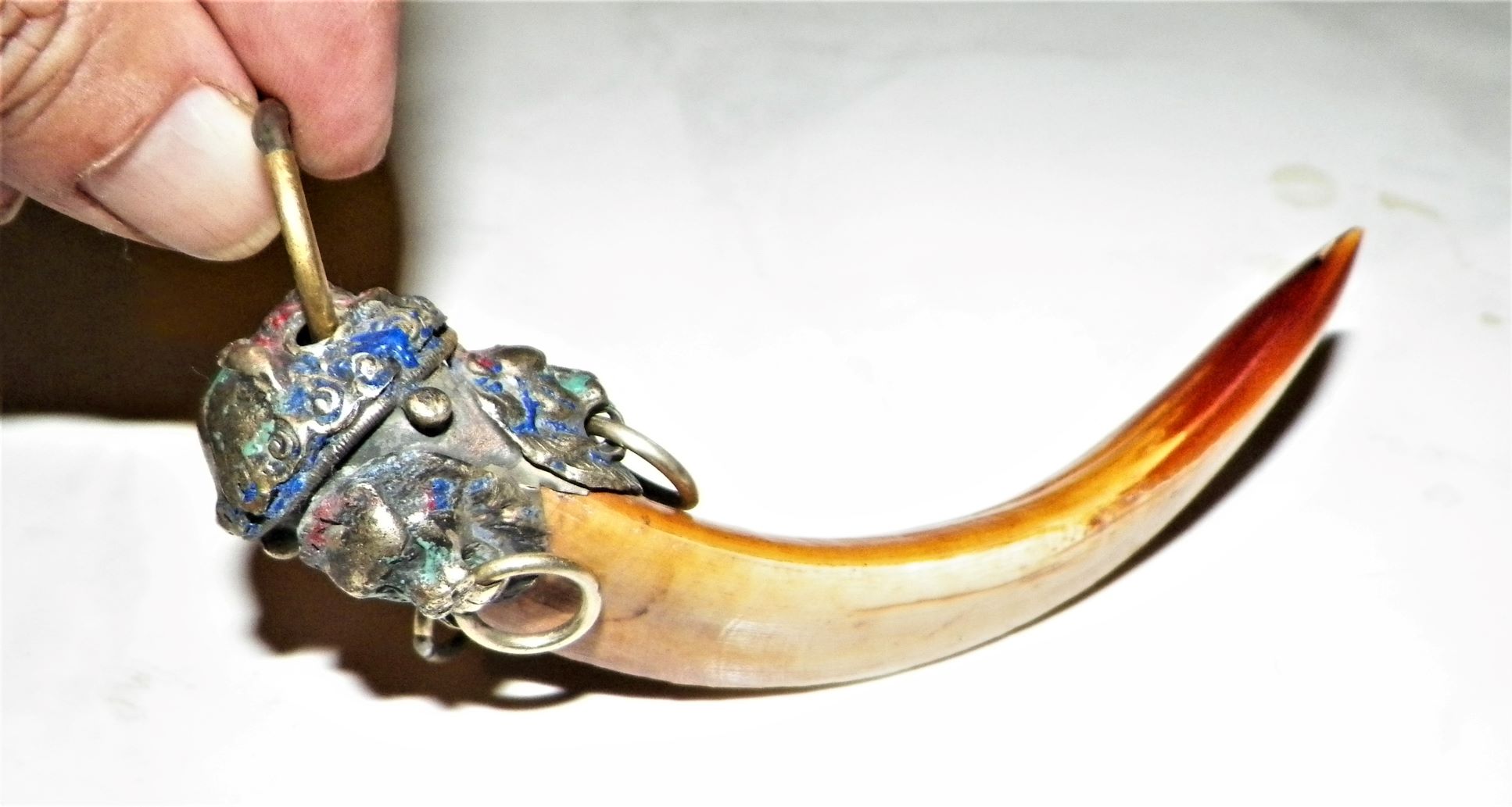 Any info on Boar's tooth(?) key ring w/thai(?) lion head cap? Antiques Board