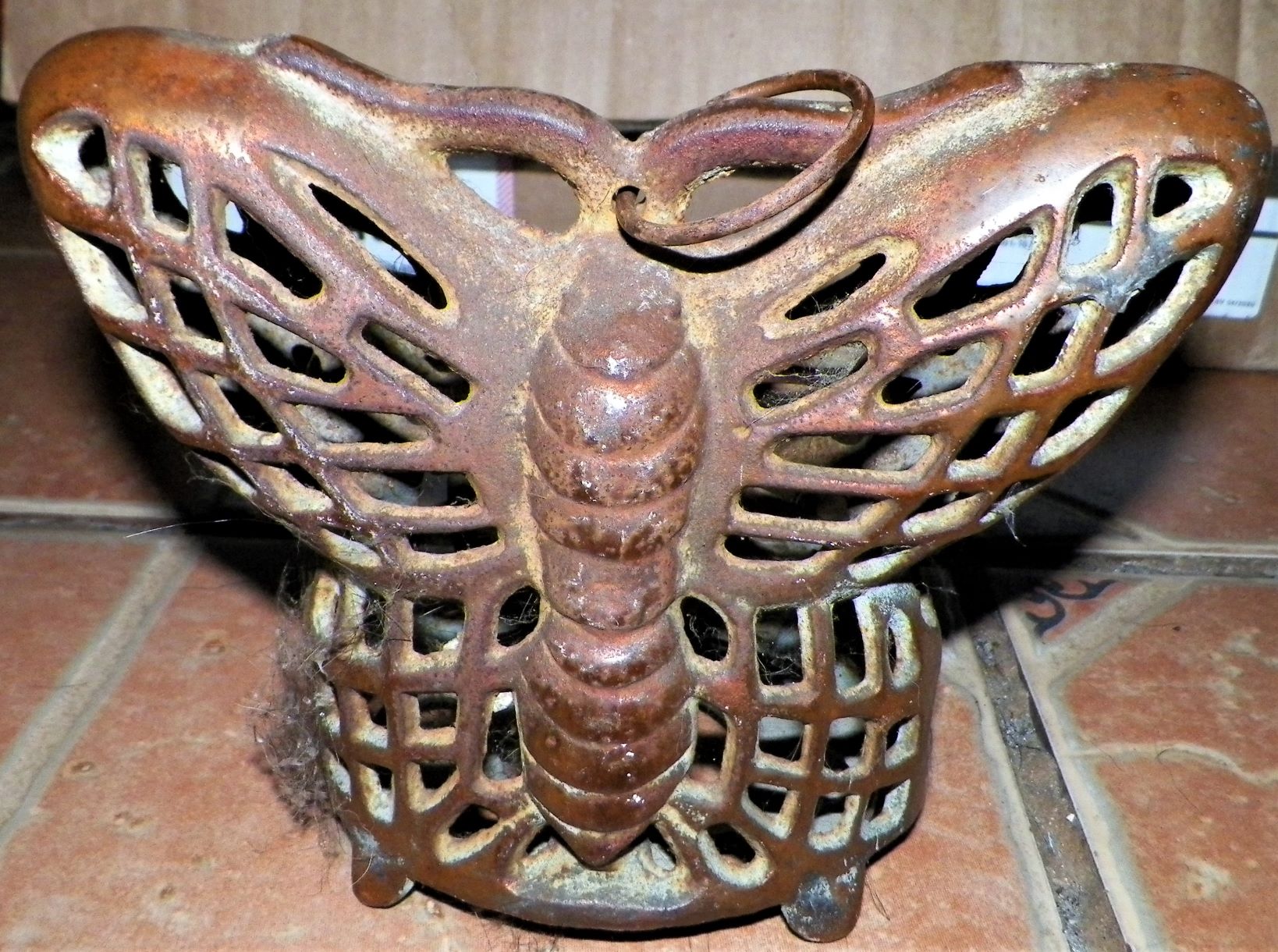 What are these 2 cast iron(?) butterflys with cage bodies incense