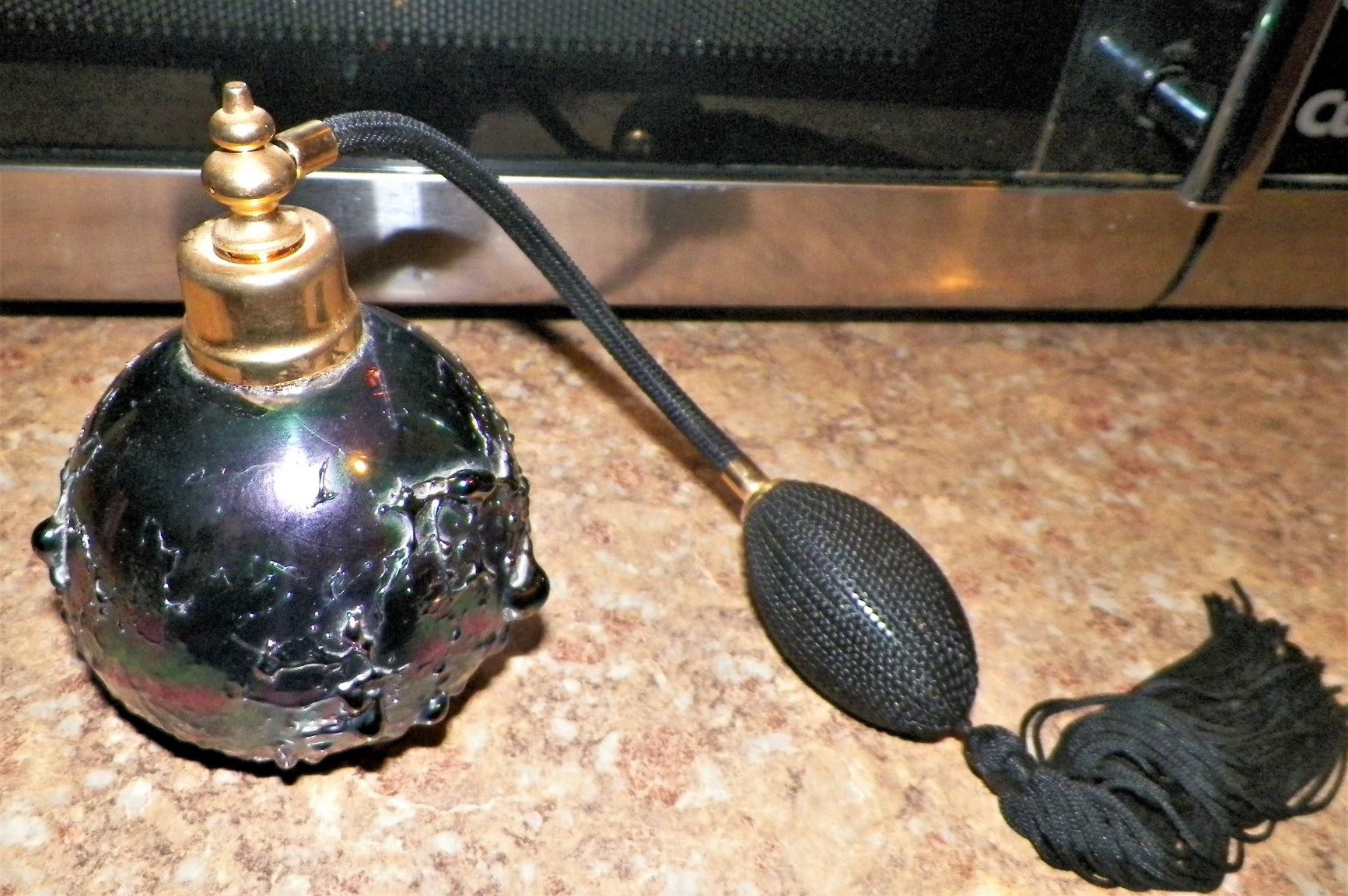 COLLECTIBLE PERFUME BOTTLE BLUE ISH 1AA.JPG