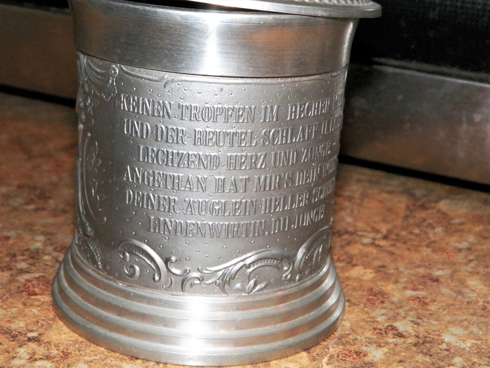 COLLECTIBLE TOBACCO JAR ALUMINUM GERMAN WRITING 2AA.JPG