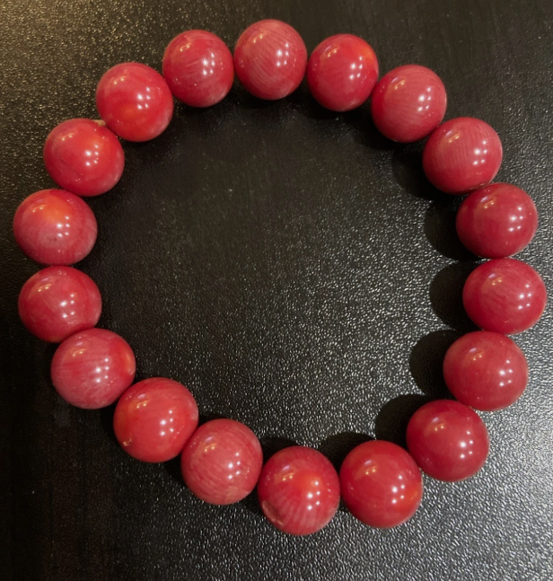Coral bracelet.png