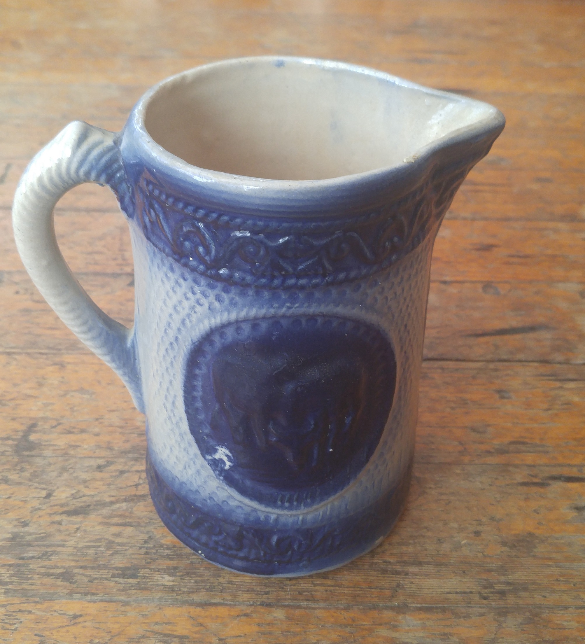 cow pitcher left.jpg