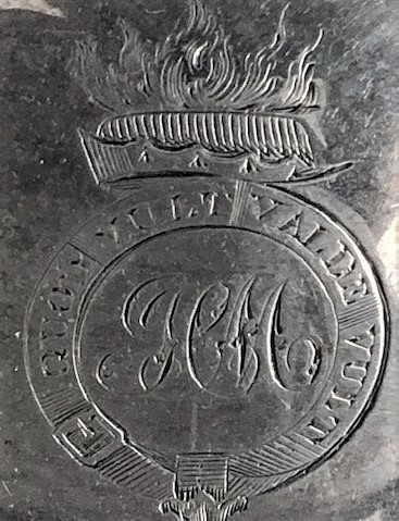crest on silver dish.jpg
