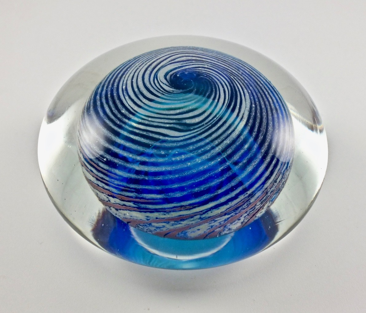 Help with a Signature on a Paperweight Antiques Board