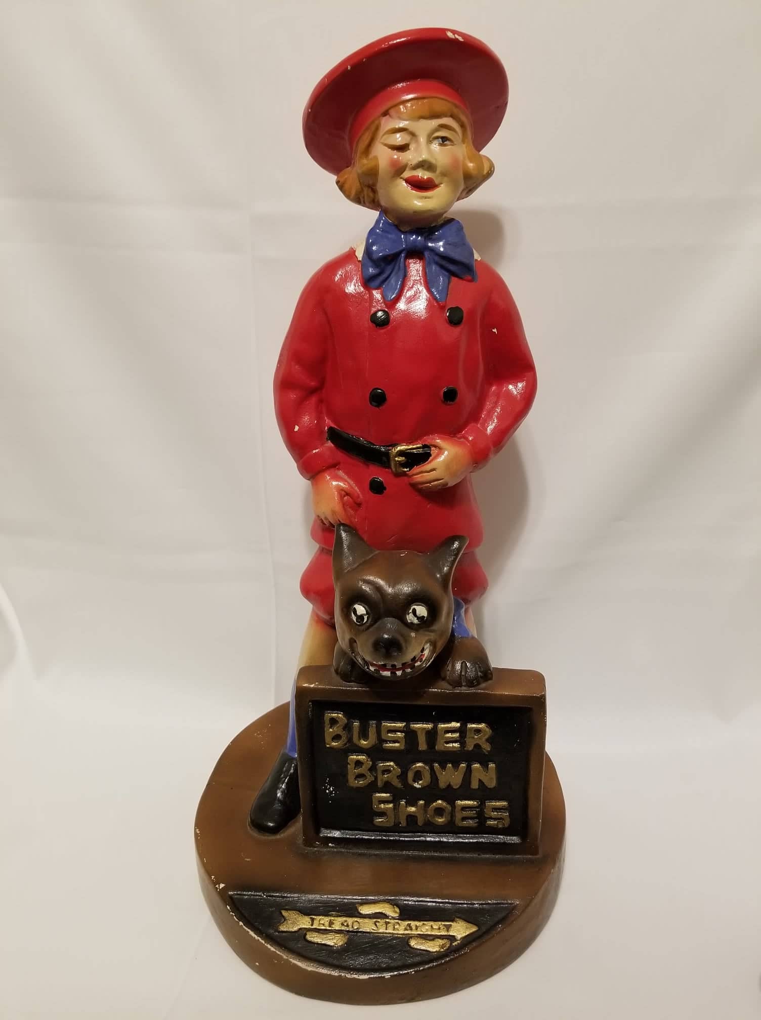 Buster Brown Shoes advertising statue. Antiques Board