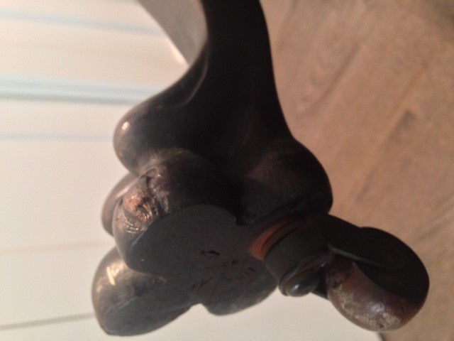 front paw with wooden caster.jpg