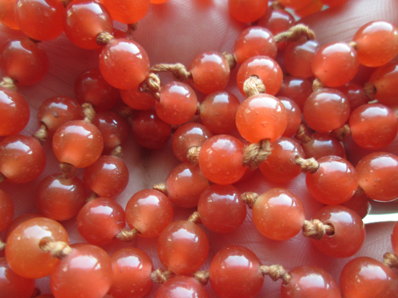 Chinese long orange glass beads Antiques Board