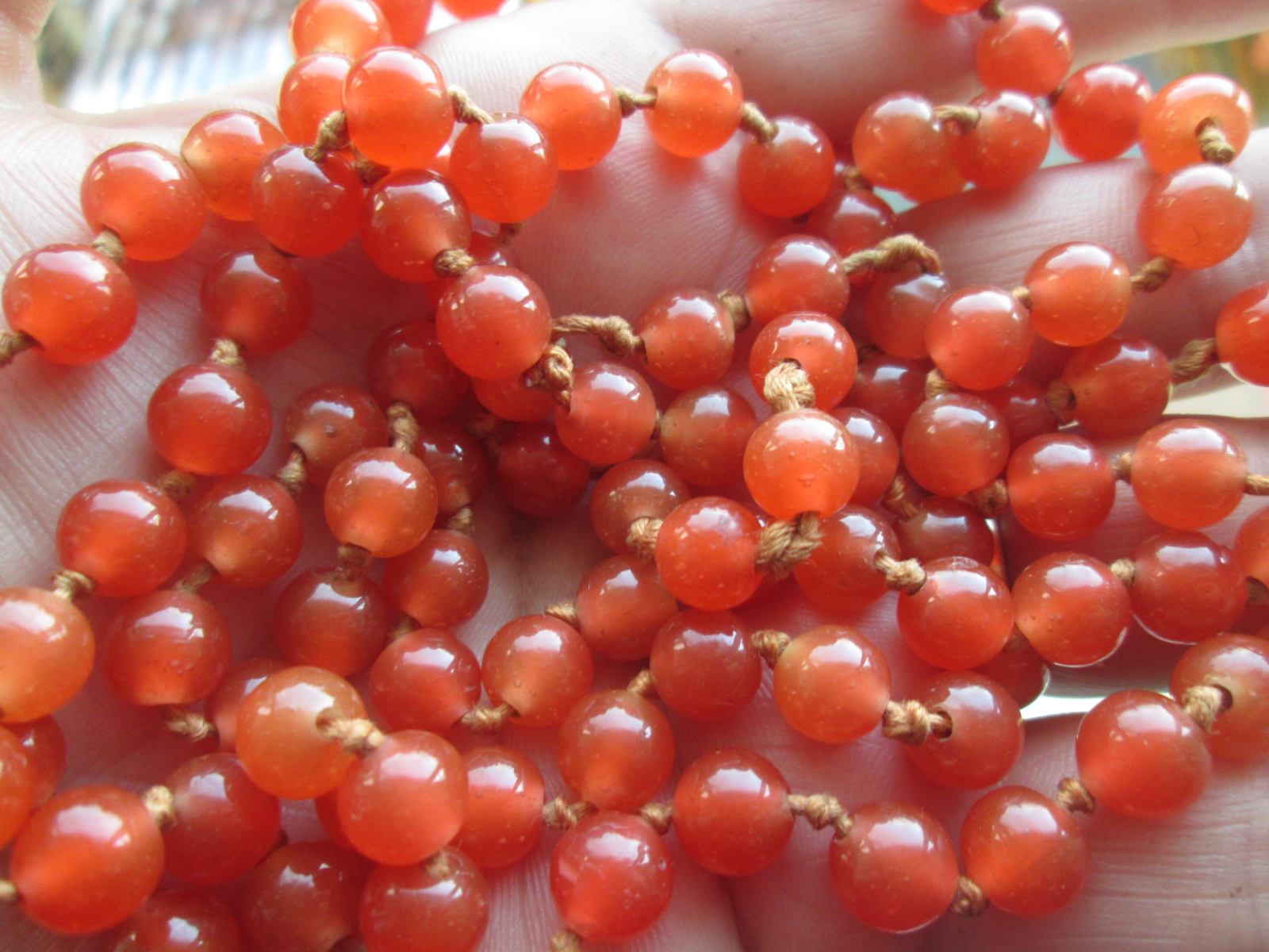 Chinese long orange glass beads Antiques Board