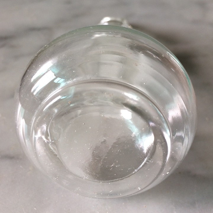 glass bottle with pointy stopper bottom.jpg