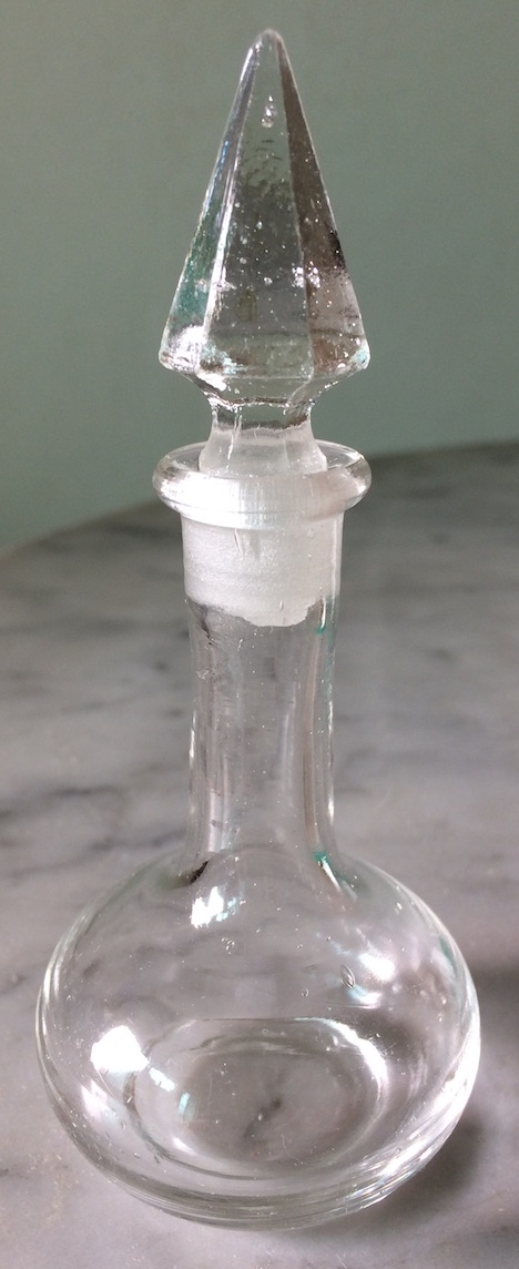 glass bottle with pointy stopper.jpg