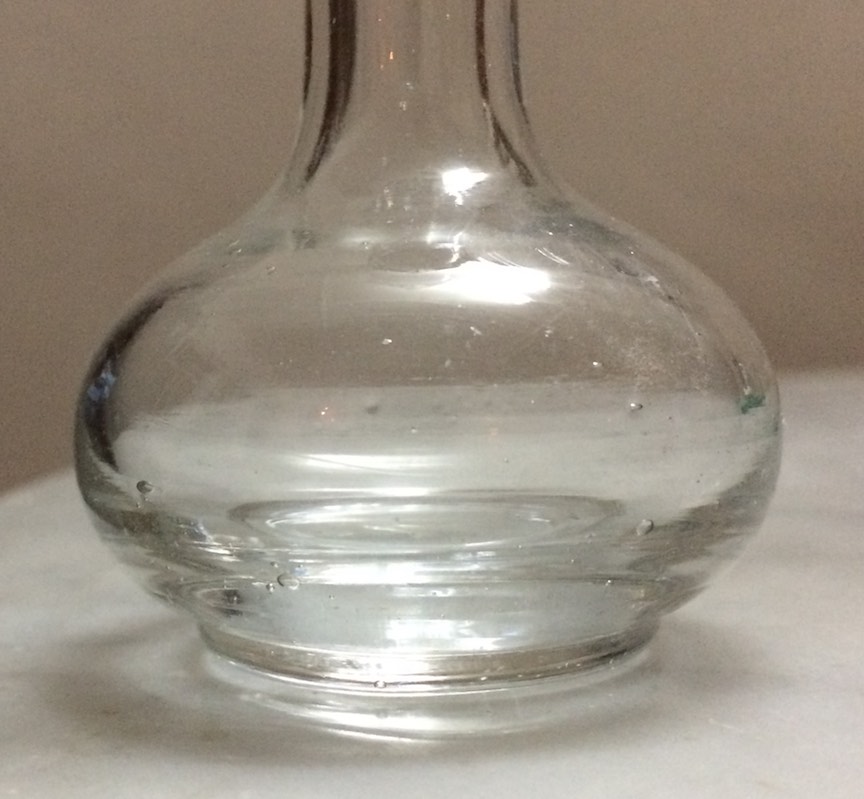 glass bottle with pointy stopper side.jpg