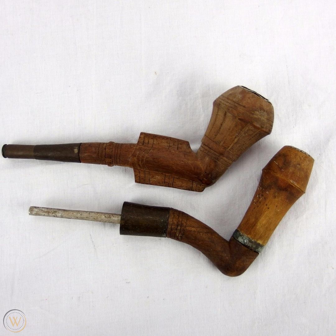 hand-carved-pipes-montagnard-vietnam_1_ffb0b8701eb93a46f3ce6f9424874979.jpg