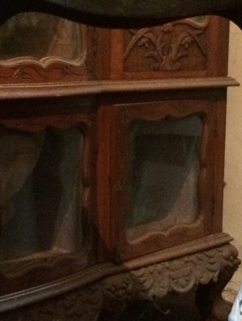his cupboard bottom carvings.jpg
