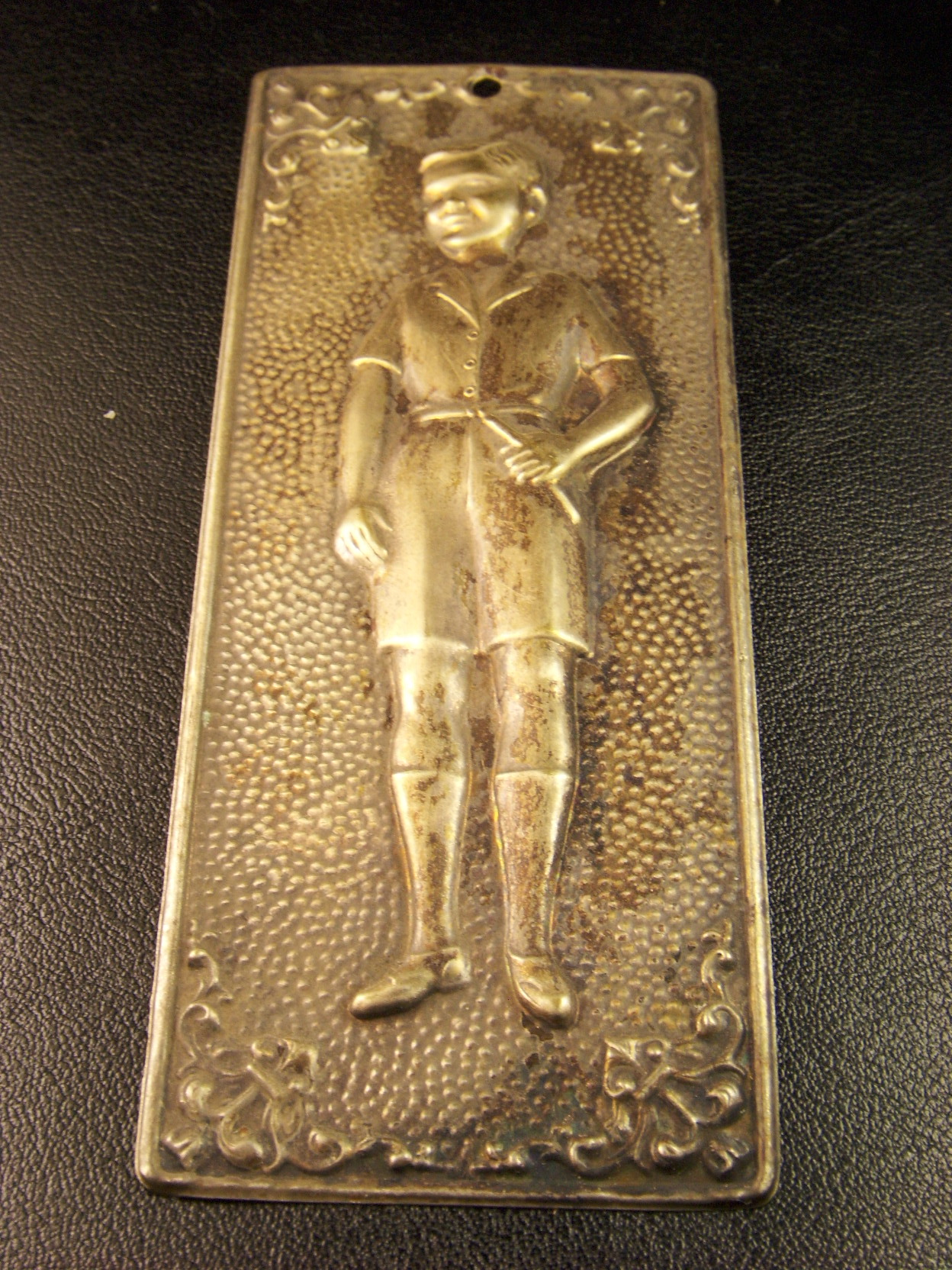 Old metal plaque Antiques Board
