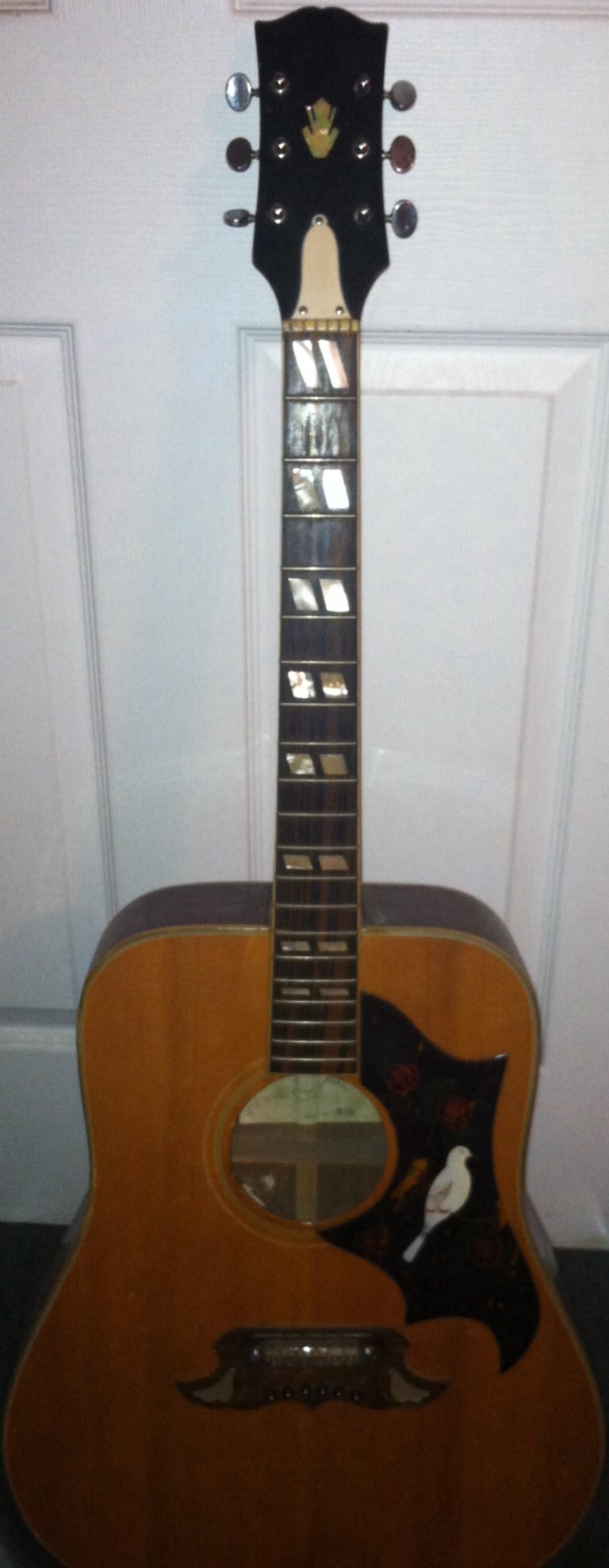 Westbrook Guitar but with Gibson Dove design. Antiques Board
