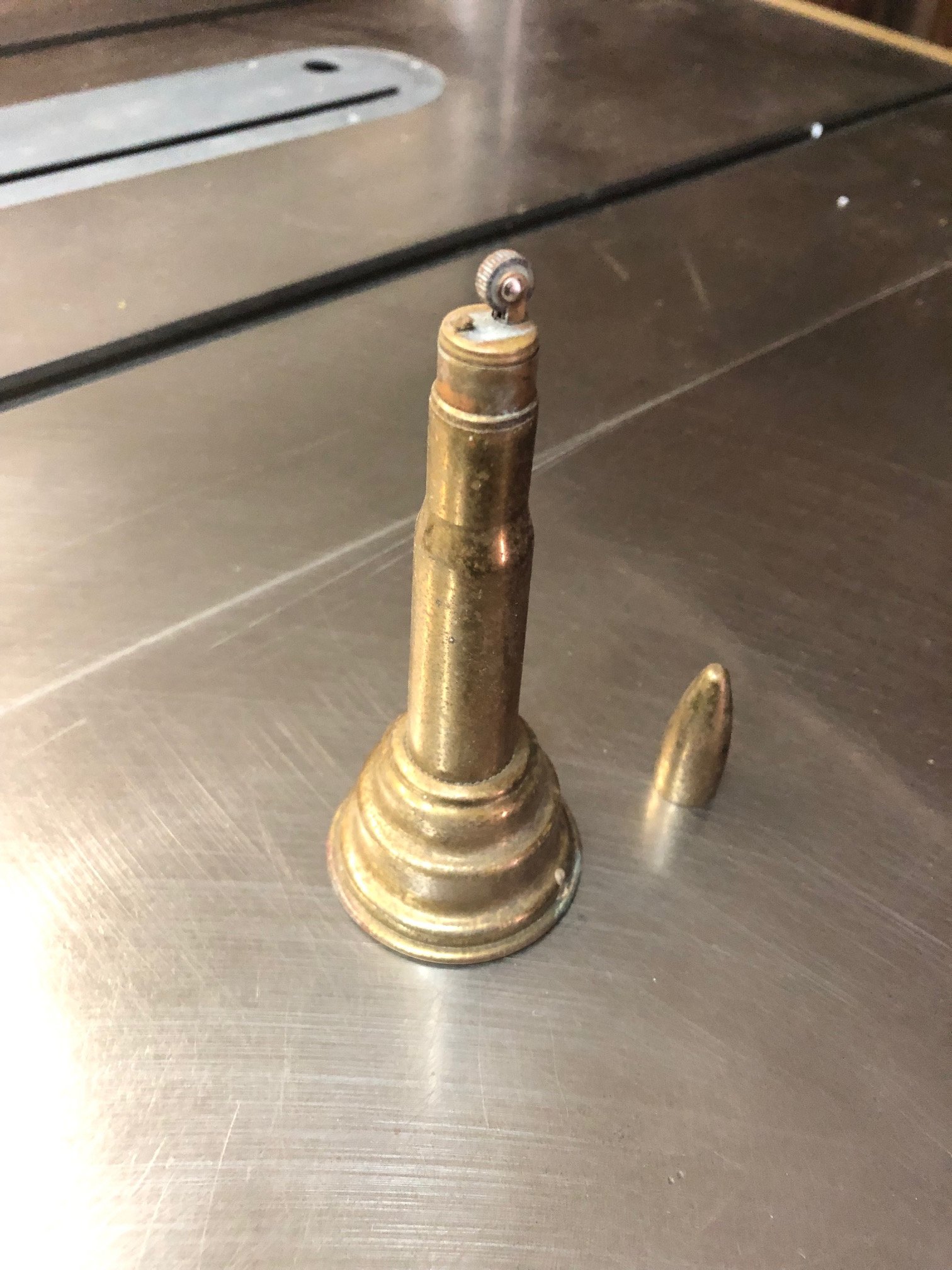 50 cal brass cigarette lighter Antiques Board