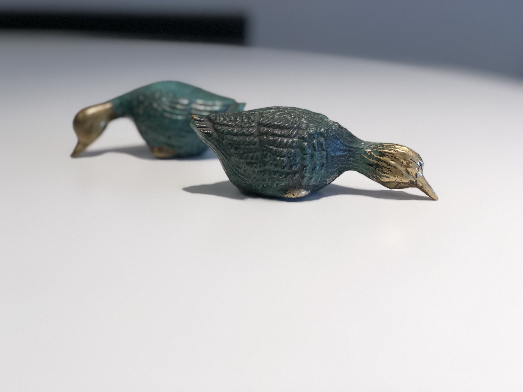 Odd pair of iron birds Antiques Board