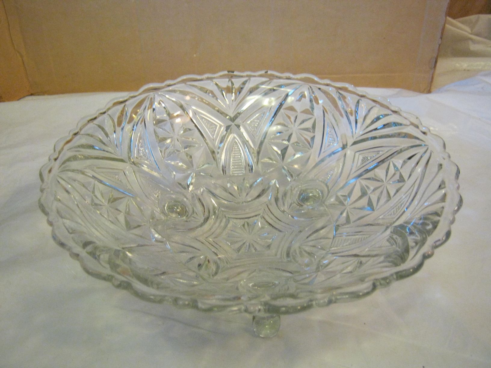 3 footed clear glass patterned scalloped bowl Antiques Board