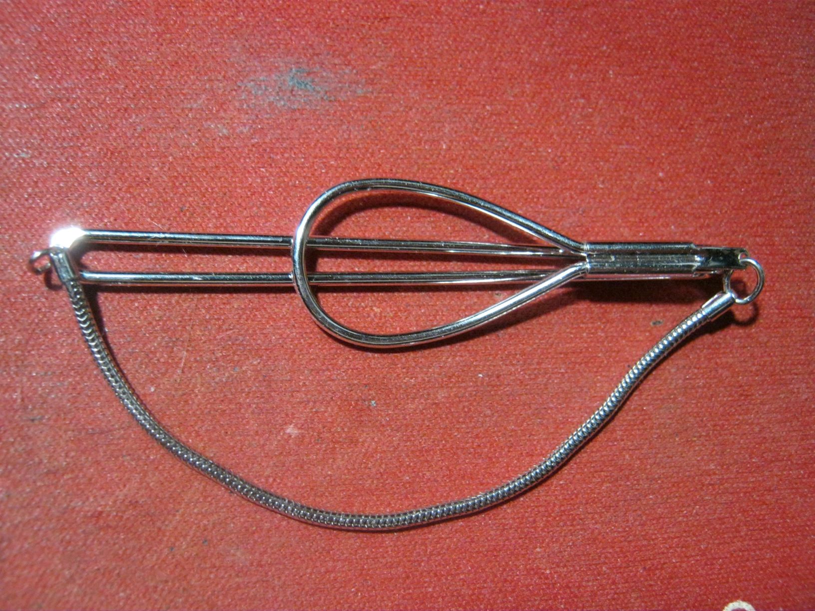 Vintage Chromed wired tie clip with chain Antiques Board