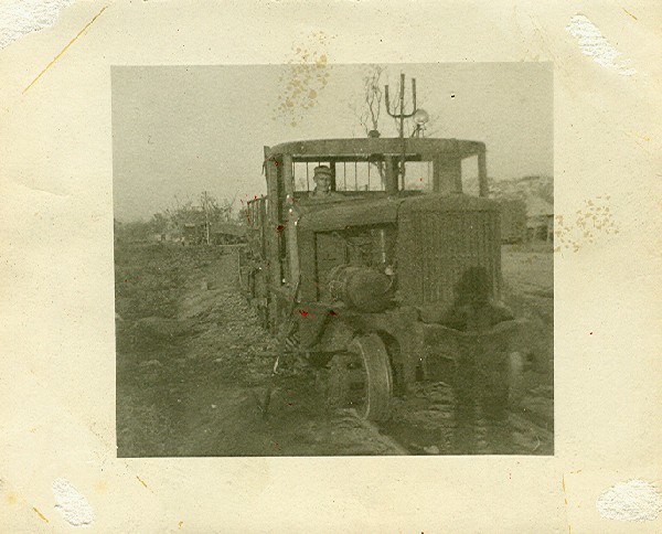 Jim in captured Japanese locomotive.jpg